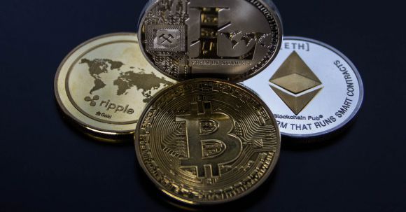 Bitcoin - Four Assorted Cryptocurrency Coins