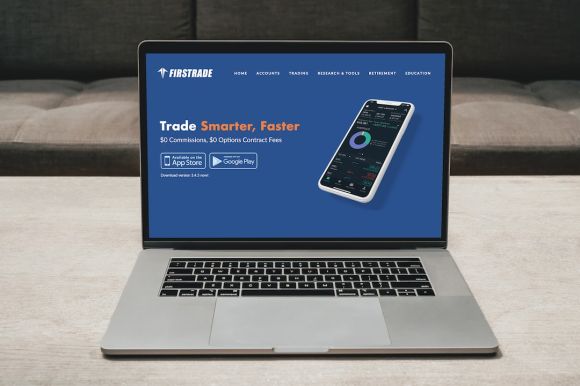 Coinbase - a laptop with a blue screen