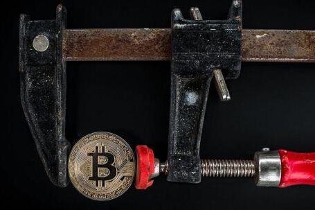 Blockchain - Black and Red Caliper on Gold-colored Bitcoin